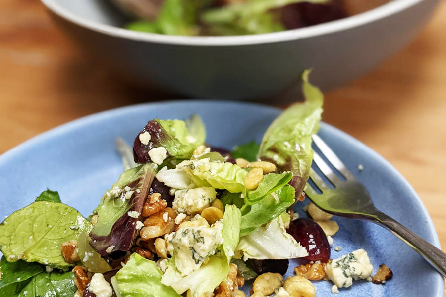 Fava bean salad on a blue plate